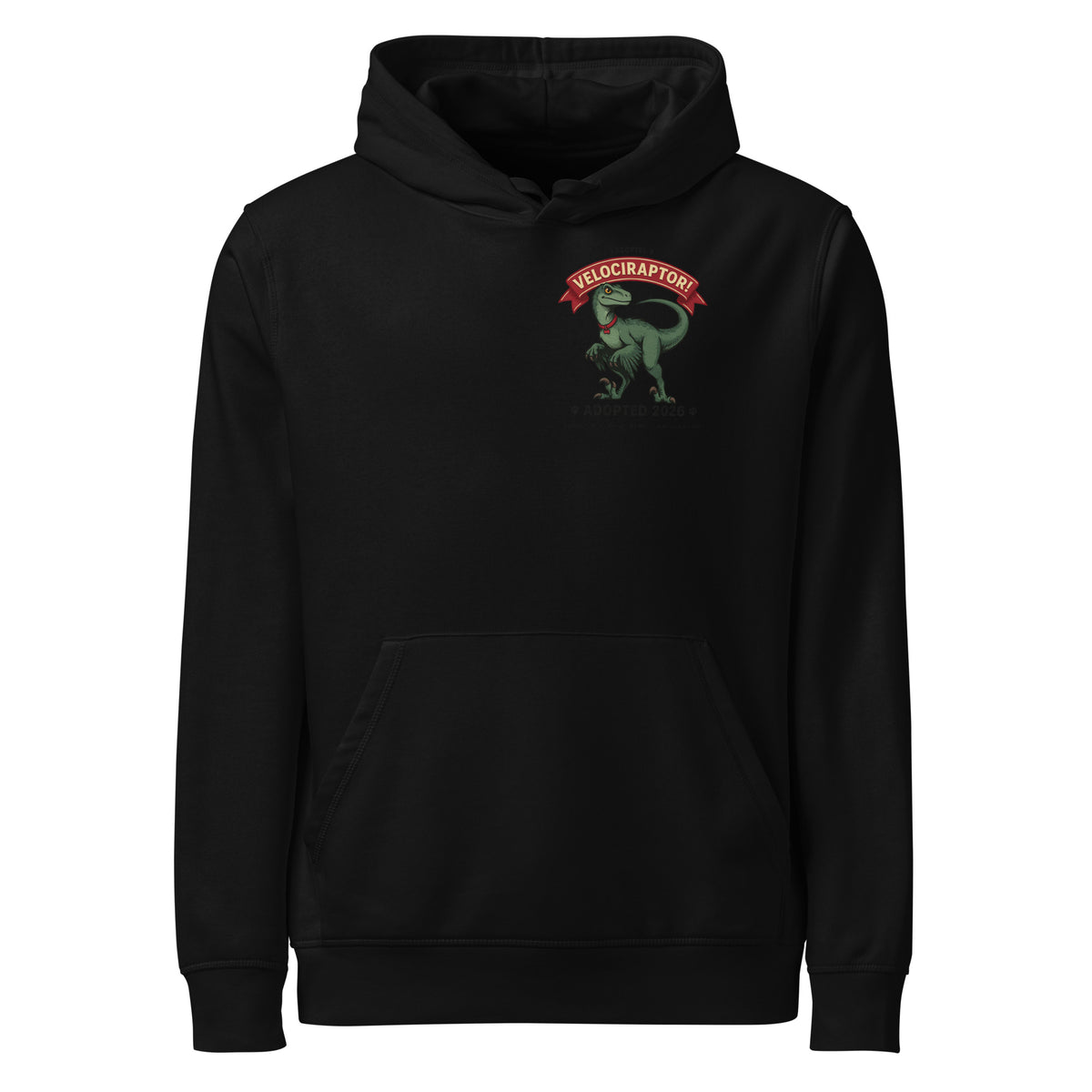 I Adopted a Velociraptor hoodie in black, front view, with a small left-chest print: green raptor under a red banner
