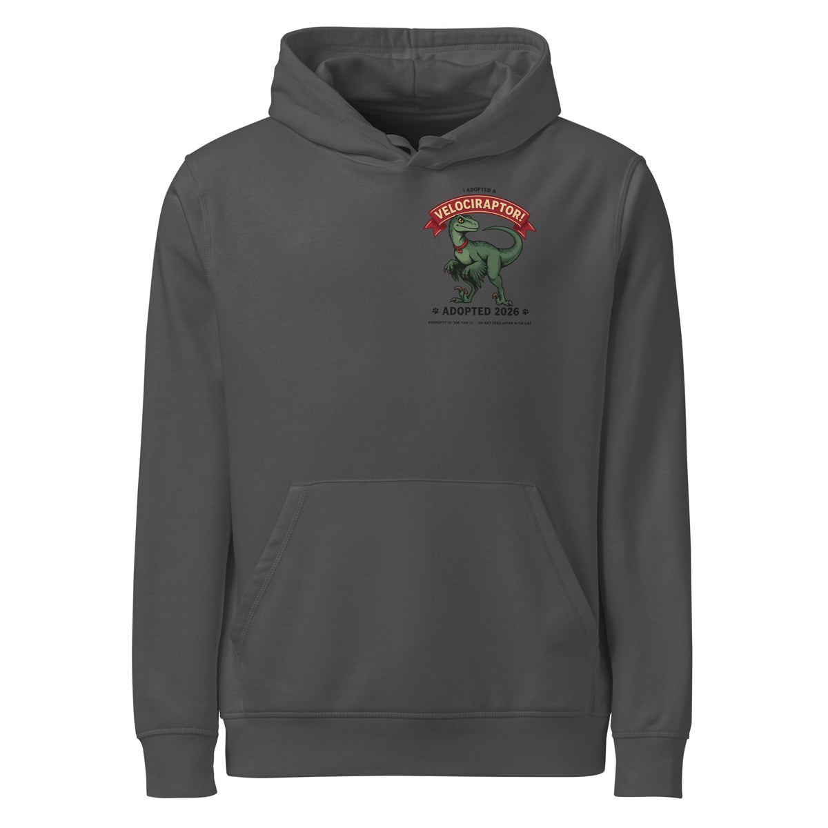 I Adopted a Velociraptor hoodie in dark gray, front view, with a small left-chest print: green raptor under a red banner